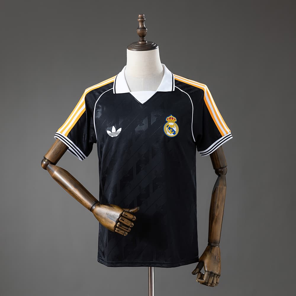 Real Madrid Concept Noir Orange 26/27
