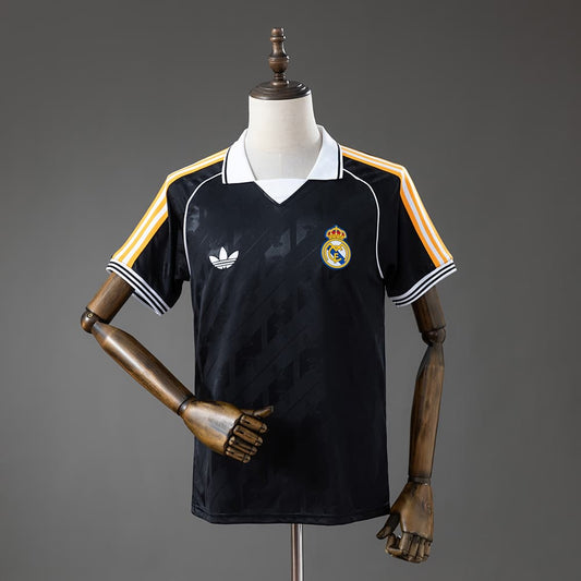 Real Madrid Concept Noir Orange 26/27
