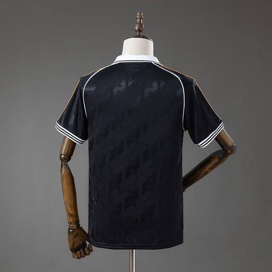 Real Madrid Concept Noir Orange 26/27